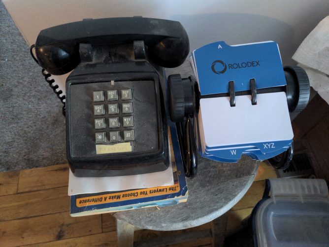 Black Western Electric 2500 telephone with Rolodex.